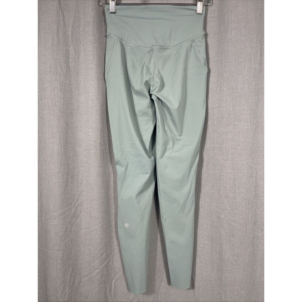Lululemon Base Pace High Rise Tight 25"‎ Women 4 Green Drawstring Stretch Pocket